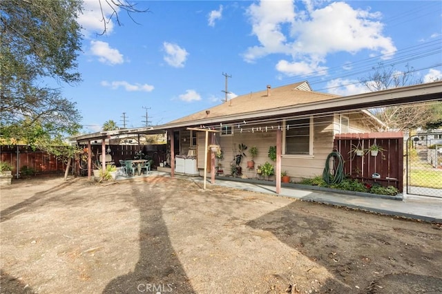 back of property featuring a patio