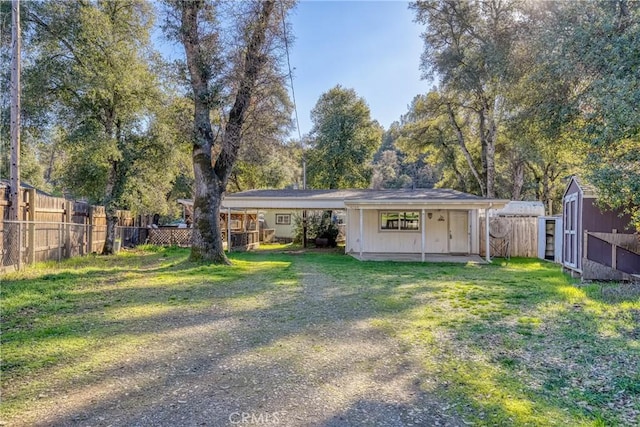 exterior space with a storage shed