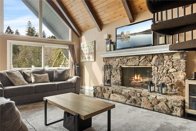 living room with wood ceiling, beam ceiling, high vaulted ceiling, carpet, and a fireplace