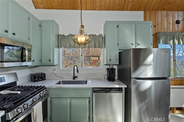 kitchen featuring wood ceiling, appliances with stainless steel finishes, light stone countertops, and sink