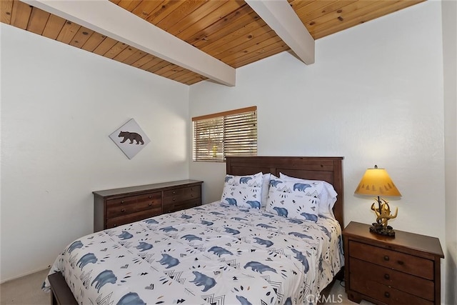 carpeted bedroom featuring beam ceiling and wooden ceiling