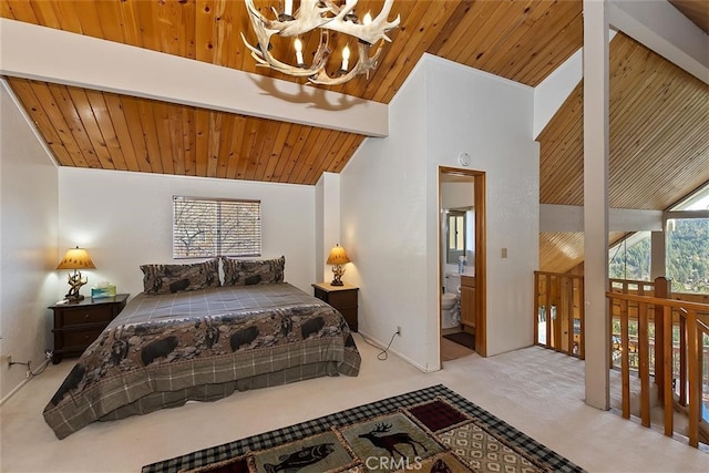 bedroom with ensuite bathroom, light colored carpet, wood ceiling, and high vaulted ceiling