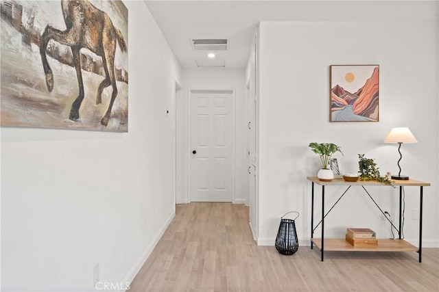 hall featuring light hardwood / wood-style floors