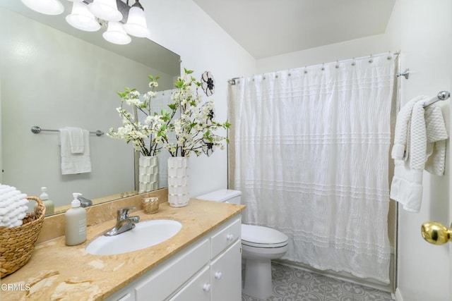 full bathroom with vanity, toilet, tile patterned floors, and shower / bath combo with shower curtain