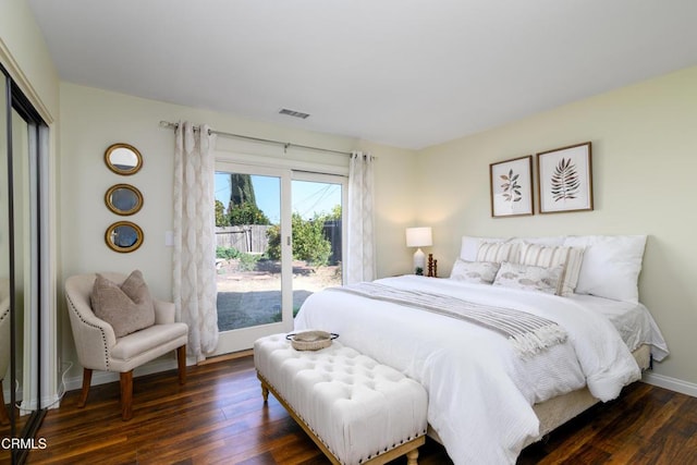 bedroom featuring dark hardwood / wood-style flooring