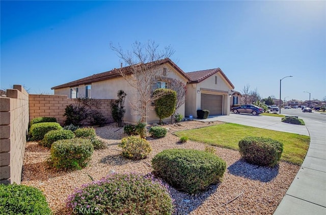 single story home with a garage