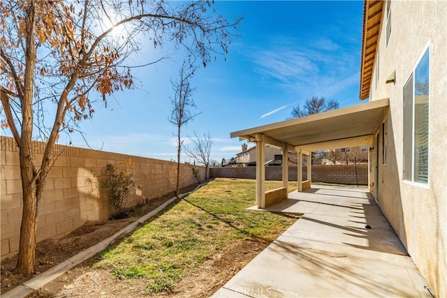 view of yard with a patio area