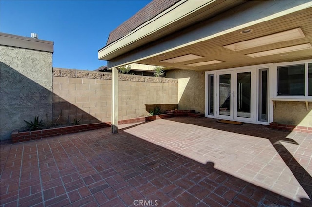 view of patio featuring french doors