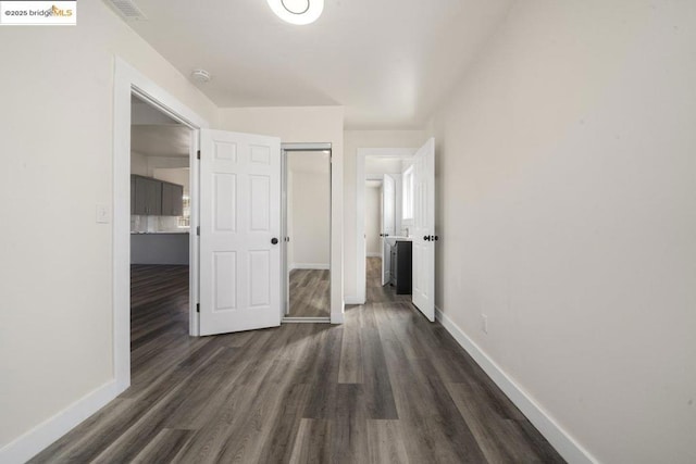 hall featuring dark hardwood / wood-style floors