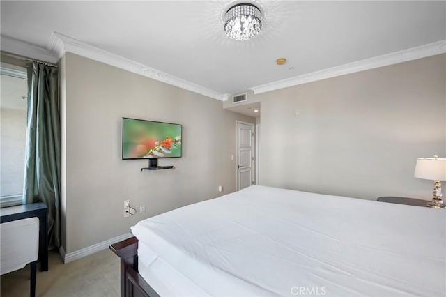 bedroom with crown molding and light colored carpet