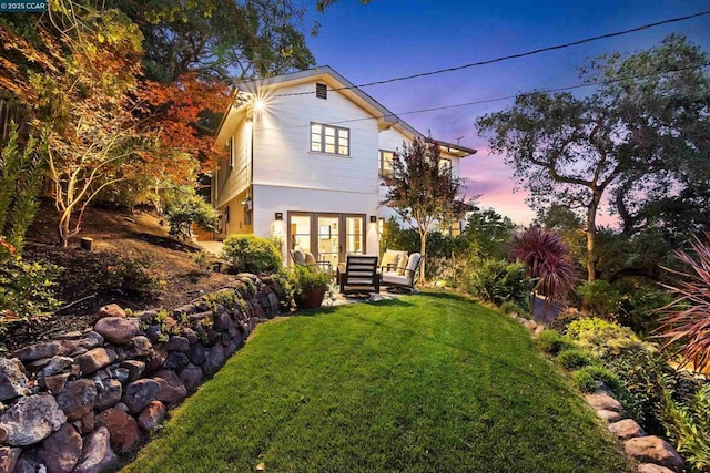 exterior space featuring french doors and an outdoor hangout area