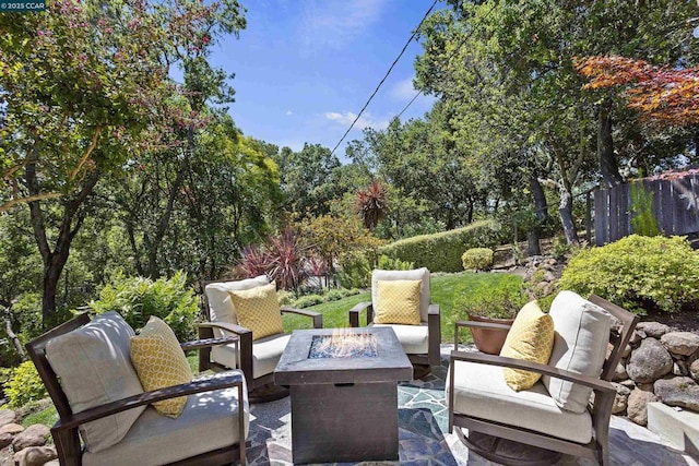 view of patio / terrace with a fire pit