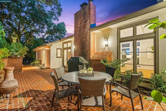 patio terrace at dusk with grilling area