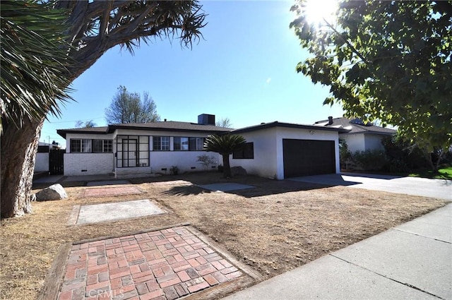 ranch-style house with a garage