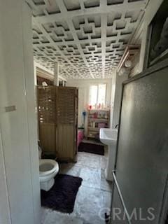 bathroom featuring toilet