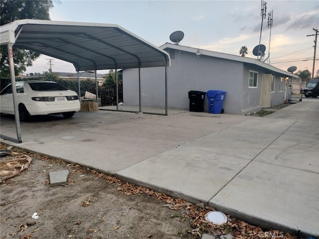 view of car parking featuring a carport