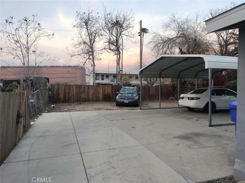 parking at dusk with a carport