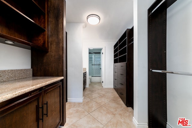 interior space featuring light tile patterned floors