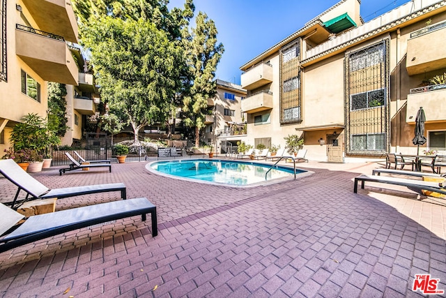 view of pool with a patio