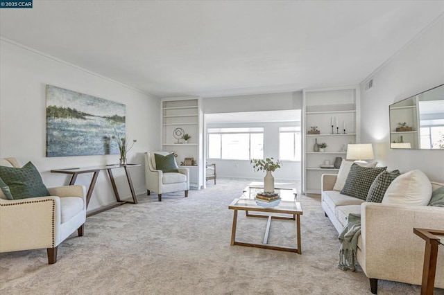 carpeted living room featuring crown molding