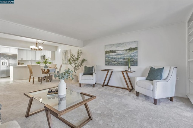 living room with light carpet and an inviting chandelier