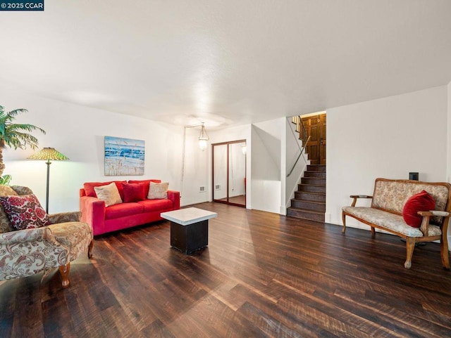 living room with dark wood-type flooring