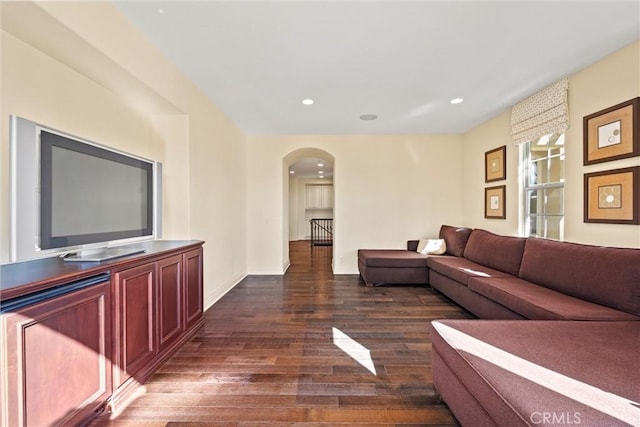 37 Triple Leaf, Irvine, CA 92620 - living room with arched walkways, dark wood-style flooring, recessed lighting, and baseboards