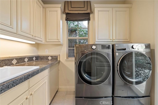 37 Triple Leaf, Irvine, CA 92620 - laundry room featuring cabinet space, washing machine and dryer, and baseboards