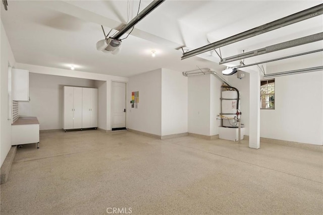 37 Triple Leaf, Irvine, CA 92620 - garage with a garage door opener, baseboards, and heating unit