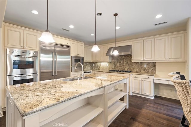 37 Triple Leaf, Irvine, CA 92620 - kitchen featuring wall chimney exhaust hood, a sink, built in appliances, open shelves, and dark wood-type flooring