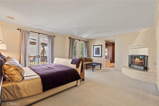 37 Triple Leaf, Irvine, CA 92620 - bedroom with light colored carpet, a fireplace, access to exterior, ornamental molding, and ensuite bath