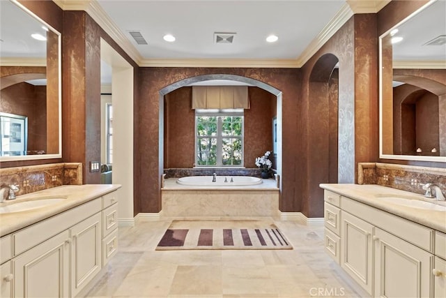 37 Triple Leaf, Irvine, CA 92620 - bathroom featuring two vanities, crown molding, a garden tub, recessed lighting, and tasteful backsplash
