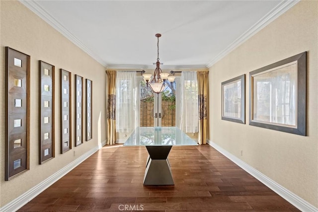 37 Triple Leaf, Irvine, CA 92620 - unfurnished dining area featuring a chandelier, crown molding, dark wood finished floors, and baseboards