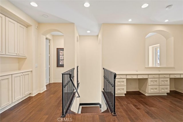 37 Triple Leaf, Irvine, CA 92620 - hallway with dark wood finished floors, an upstairs landing, recessed lighting, a desk, and arched walkways