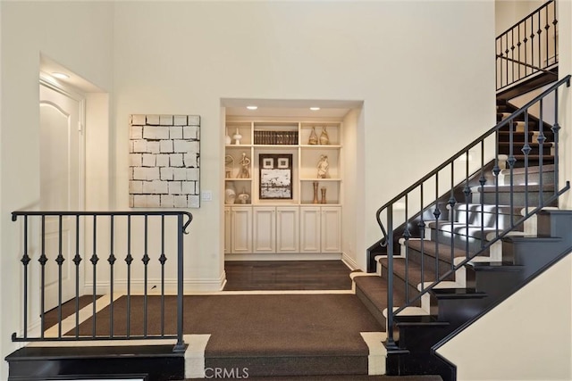 37 Triple Leaf, Irvine, CA 92620 - stairway featuring baseboards, a high ceiling, wood finished floors, and recessed lighting