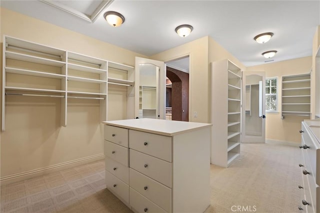 37 Triple Leaf, Irvine, CA 92620 - walk in closet with light colored carpet and arched walkways