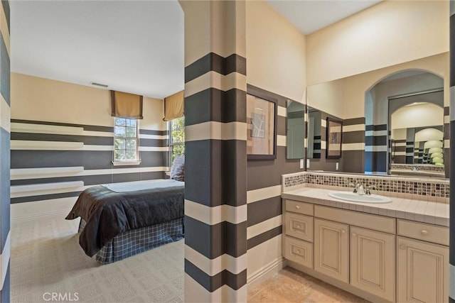 37 Triple Leaf, Irvine, CA 92620 - bathroom with vanity and tasteful backsplash
