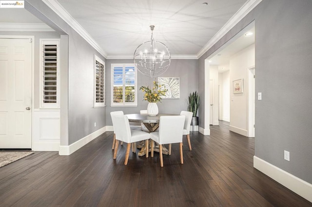 dining area with an inviting chandelier, dark wood-type flooring, and ornamental molding