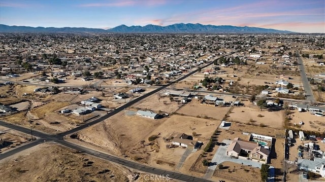 aerial view at dusk with a mountain view