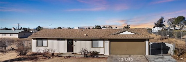 single story home with a garage