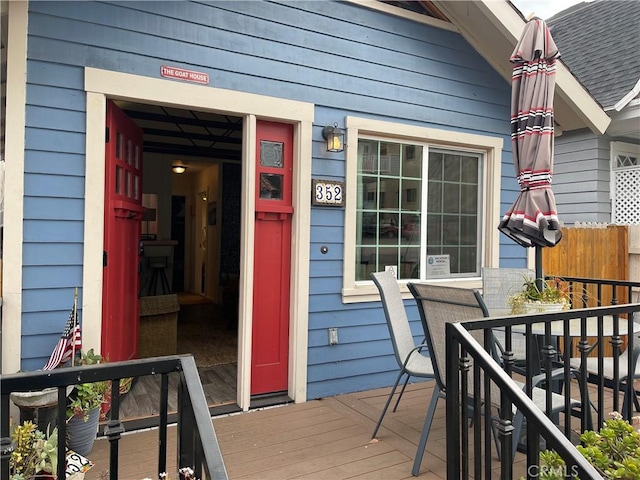 doorway to property with a deck