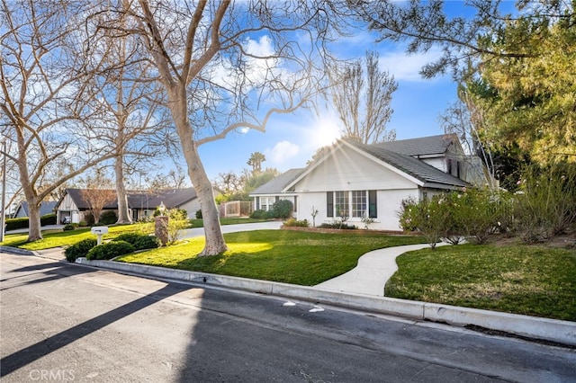 view of front of property with a front lawn