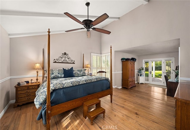 bedroom with ceiling fan, access to exterior, light hardwood / wood-style floors, and lofted ceiling with beams