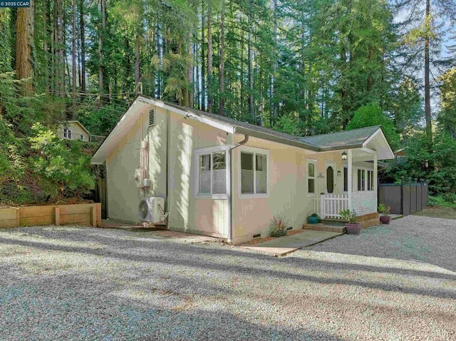 view of front of house with ac unit