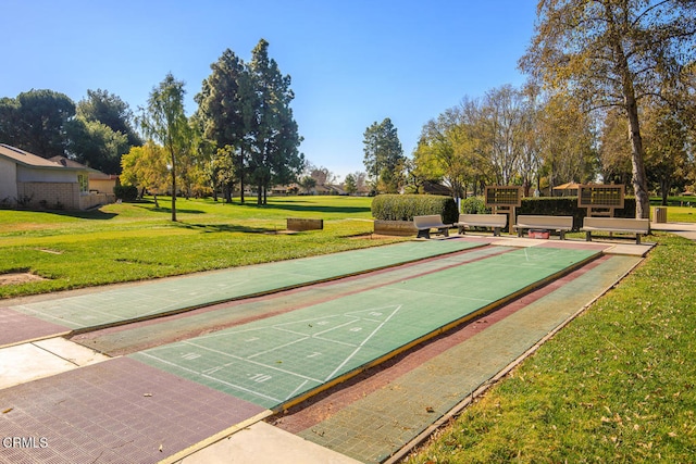 view of community with a lawn