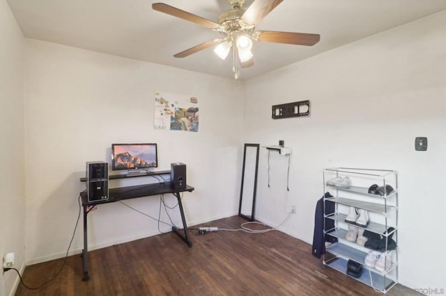 miscellaneous room featuring dark wood-type flooring and ceiling fan