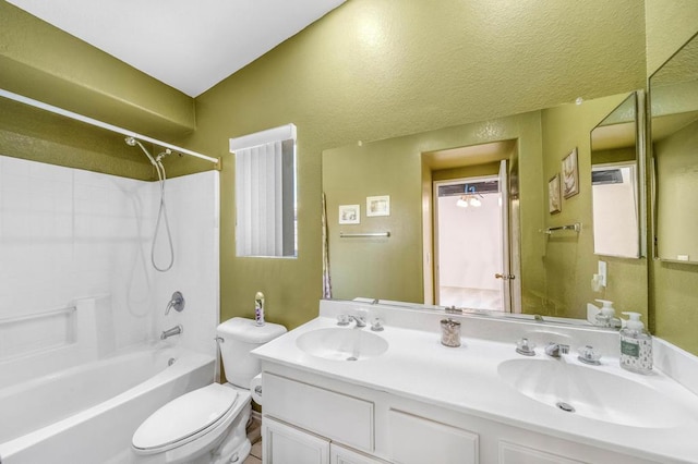 full bathroom featuring shower / washtub combination, toilet, and vanity