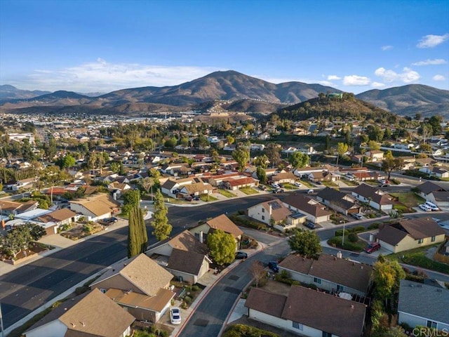 birds eye view of property featuring a mountain view