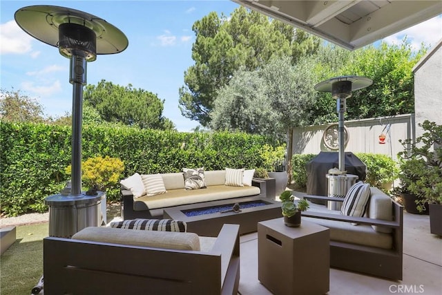 view of patio / terrace with an outdoor hangout area and grilling area