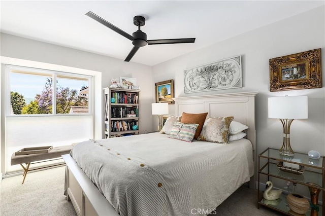 bedroom featuring ceiling fan and carpet flooring